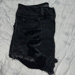 Women’s distressed high rise American eagle shorts